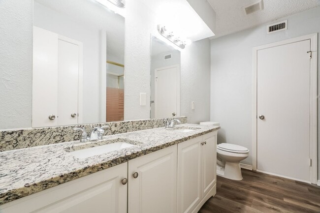 Building Photo - 4 BR/2BA | Updated Single Family Home | Gorgeous hardwoods | Storage attic!