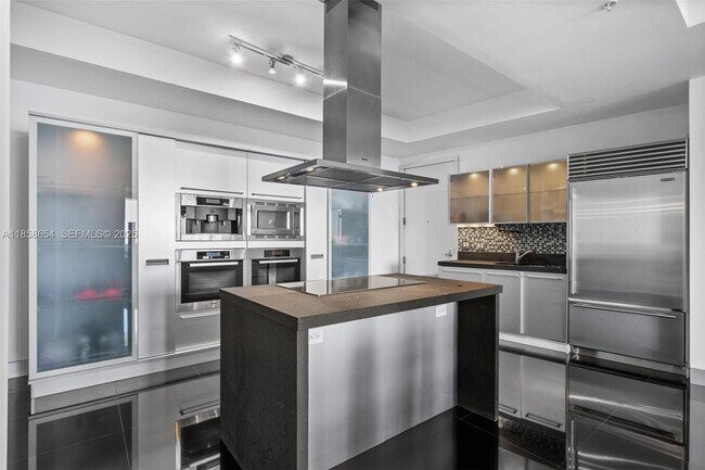 Building Photo - 18201 Collins Ave