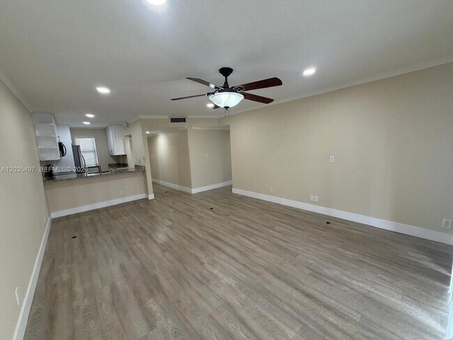 Building Photo - 8443 Royal Palm Blvd