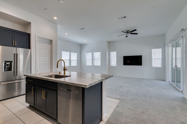 Building Photo - Stunning 4-Level Townhome in Inspirada | R...