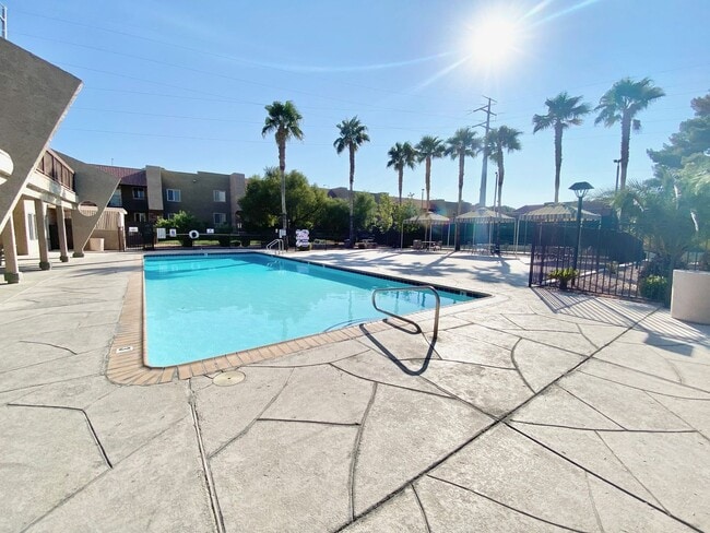 Building Photo - GUARD-GATED 1-BEDROOM CONDO WITH COMMUNITY POOL
