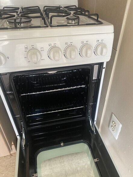 Inside stove new. - 114 E Main St