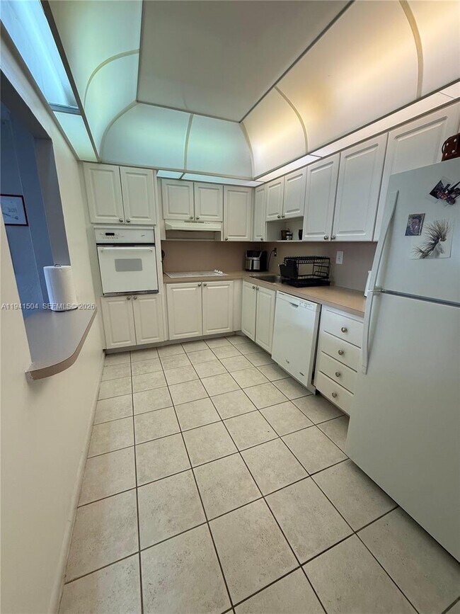 Building Photo - 19390 Collins Ave