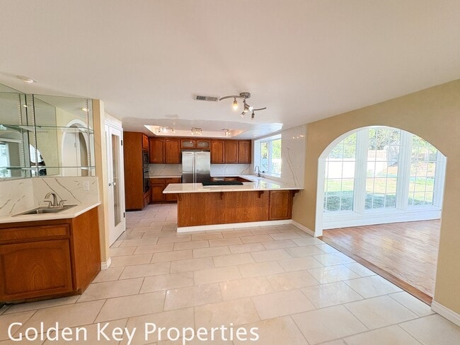 Building Photo - Welcome to this stunning 4-bedroom, 3-bathroom home located in the desirable La Costa neighborhoo...