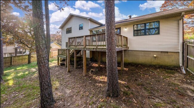 Building Photo - Welcome Home: Charming Brick Beauty with Covered Porch.