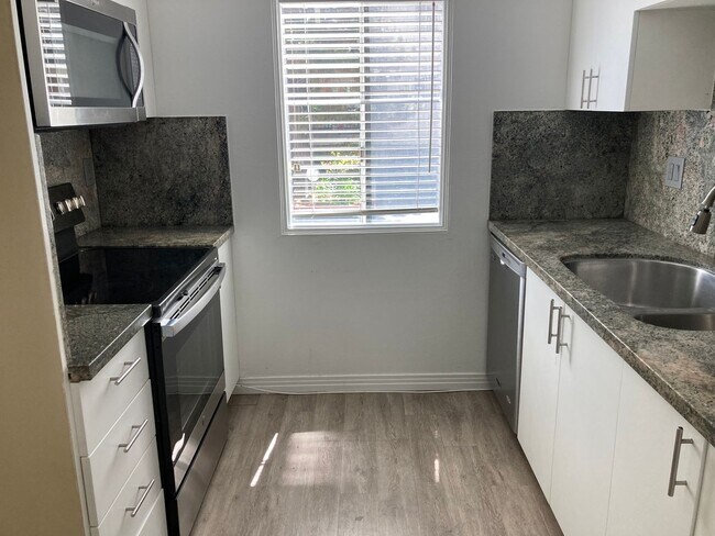 Building Photo - $3,295! Charming 2-Bed, 2-Bath Corner Unit in Gated Culver City Community!