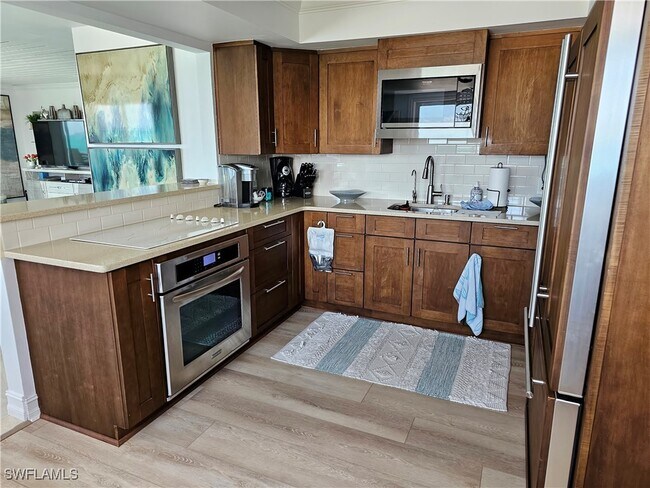 Building Photo - 9051 Gulf Shore Dr