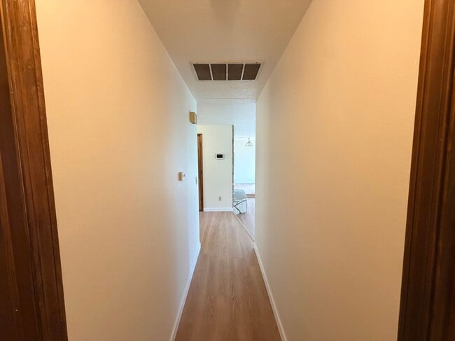 Building Photo - Brand New Flooring and Paint Upper Level Duplex
