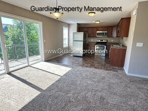 Building Photo - Champlin Corner Unit Town Home, 2 Car Garage, Dishwasher, Washer/Dryer, Balcony