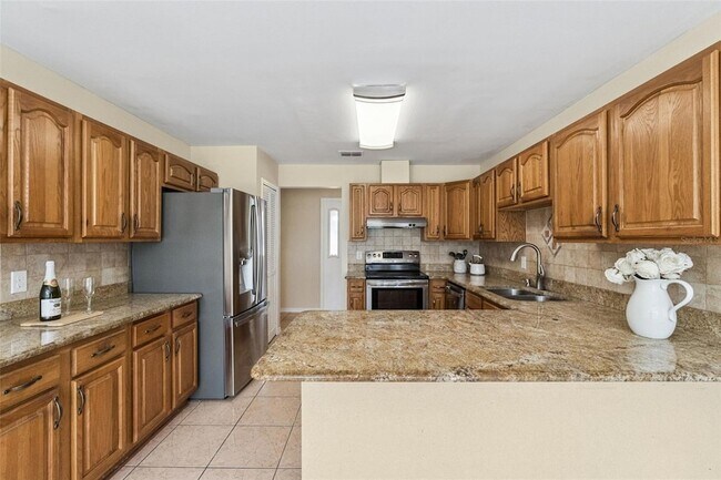 Building Photo - 4136 Tall Tree Dr
