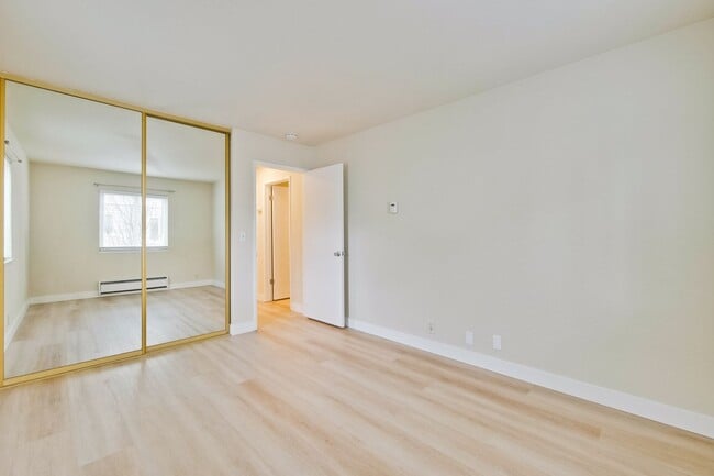 Building Photo - Refreshed 2/2 Second Floor Campbell Condominium in Great Location! Attached Garage & Additional S...