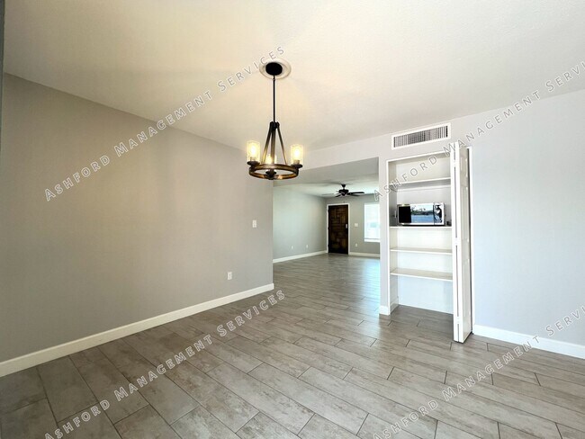 Building Photo - REMODELED 3 BEDROOM 2 BATH GEM WITH DETACH...