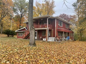 Building Photo - Log Cabin (Triplex)