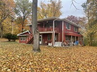 Building Photo - Log Cabin (Triplex)