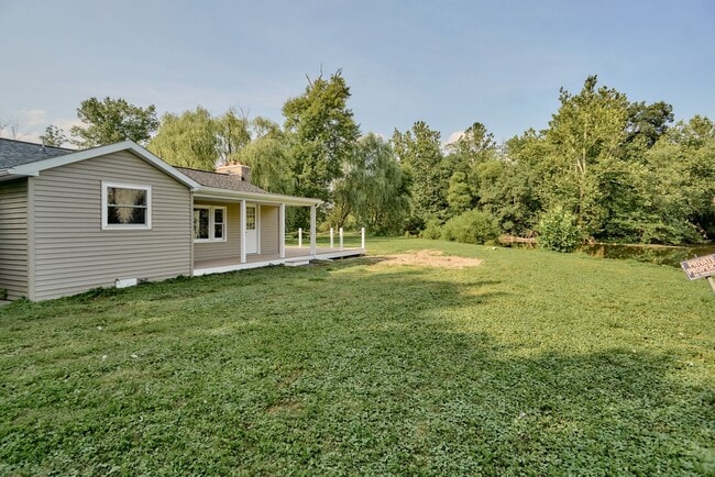 Building Photo - Creekside Charm: Your Dream, 1 of a kind, ...