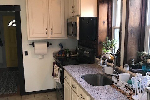 Kitchen looking towards front hallway - 28 Clayton Ave