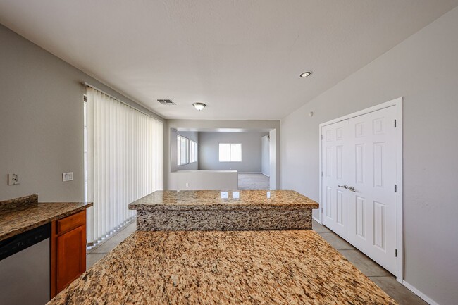 Building Photo - Welcome to this spacious 4 bedroom, 2.5 ba...