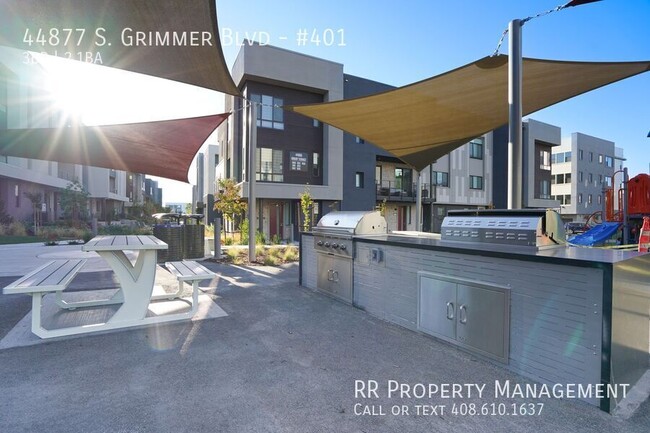 Building Photo - Brand New Top Floor Condo in Excellent Fre...