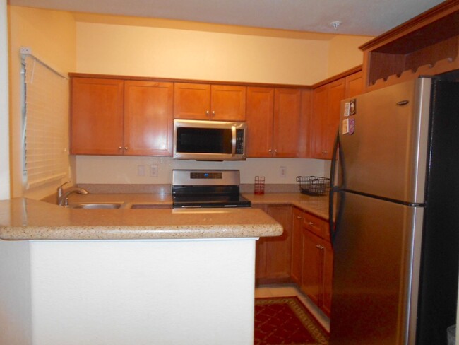 Building Photo - First Floor Fully Furnished 2 Bedroom Condo!