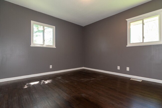 Building Photo - This charming 5-bedroom, 2-bathroom home is available for $2,000/month.