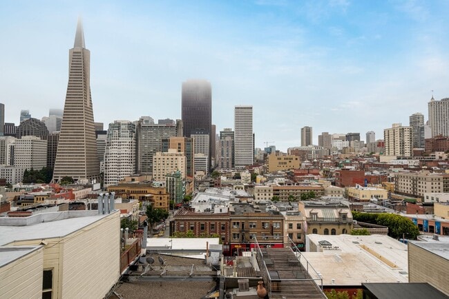 Building Photo - Remodeled pet friendly 1BR w/ shared roof deck, new kitchen, laundry