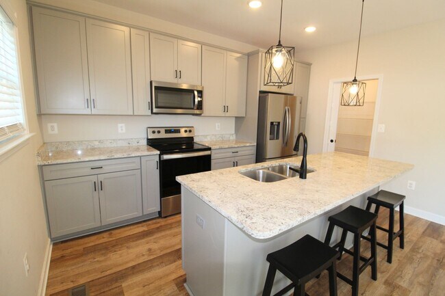 Building Photo - Spacious 4 Bedroom, 3.5 Bath Townhome with...