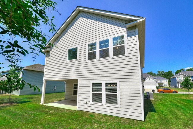 Building Photo - Beautifully maintained 4 / 2.5 home in Joh...