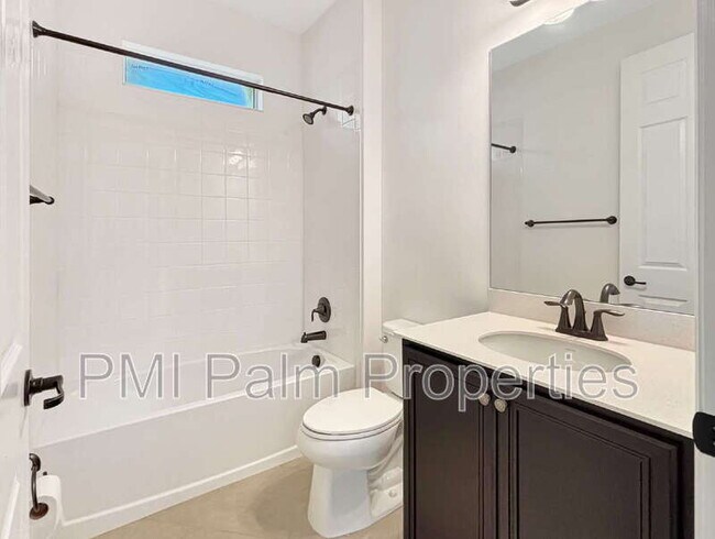 Building Photo - 9870 SW Trumpet Tree Cir