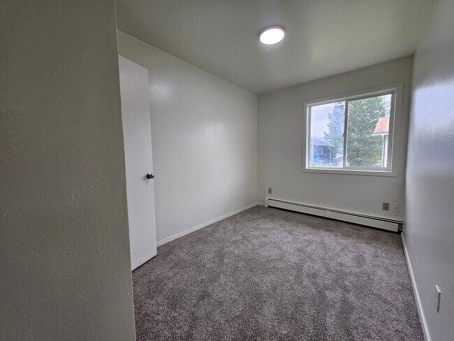 Building Photo - 8011 E 16th Ave