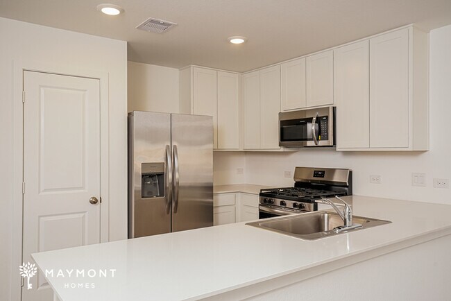 Building Photo - Your Next Home in Sunterra – Amenities You’ll Love