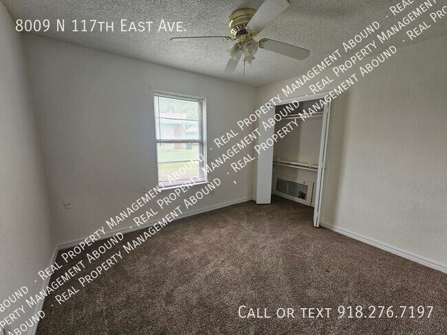 Building Photo - 8009 N 117th E Ave