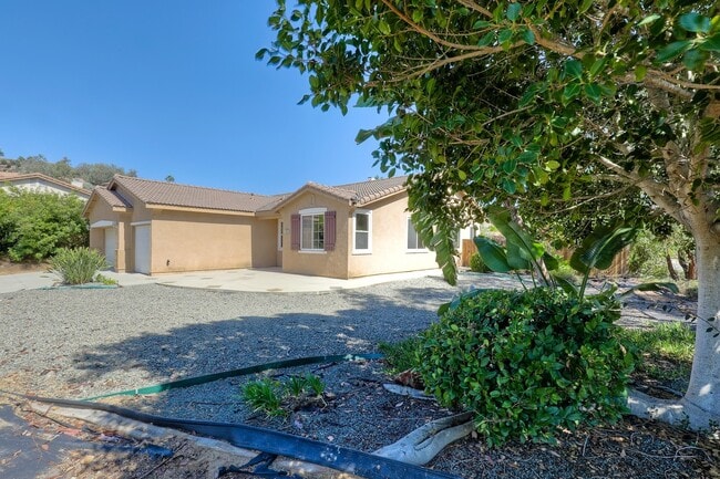 Building Photo - Charming 1-Story Corner Lot Home with Great Room & Patio