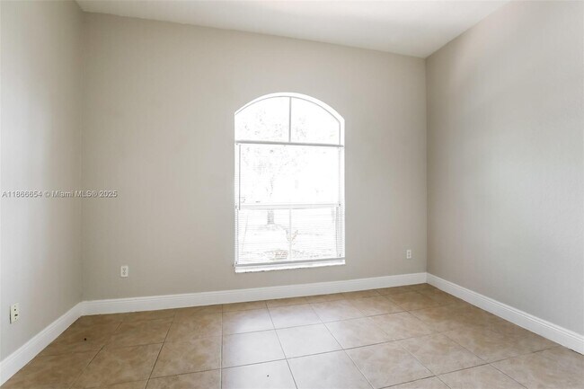 Building Photo - 1695 NE 37th Pl