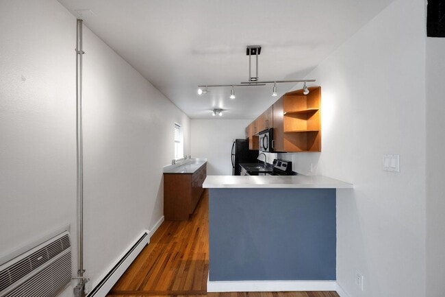 Building Photo - Charming 2BR Condo in Denver
