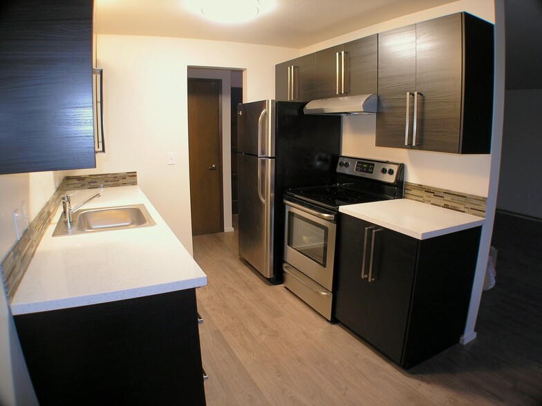 Kitchen with stainless appliances - 4223 3rd Avenue Northwest