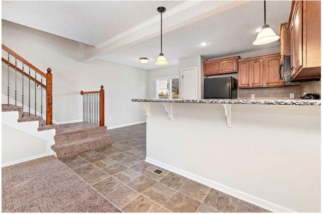 Building Photo - Spacious Two Bedroom Townhome - Available end of February