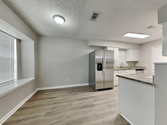Building Photo - 7047 Rockergate Dr