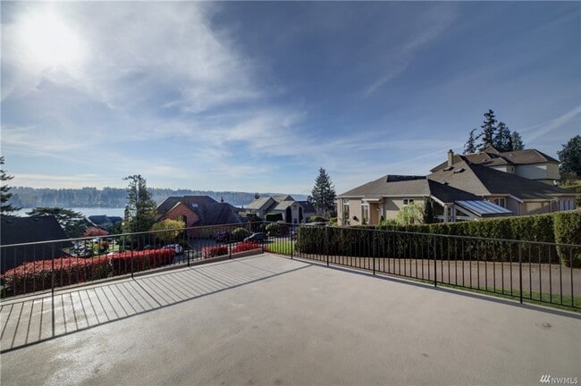 Building Photo - 8479 NE Woodland Cove Dr