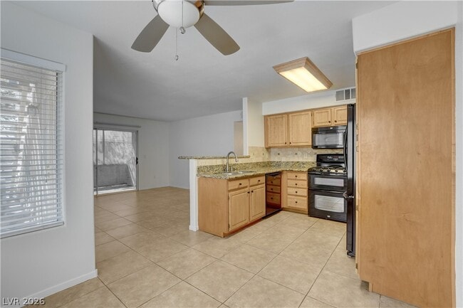 Building Photo - 5710 E Tropicana Ave