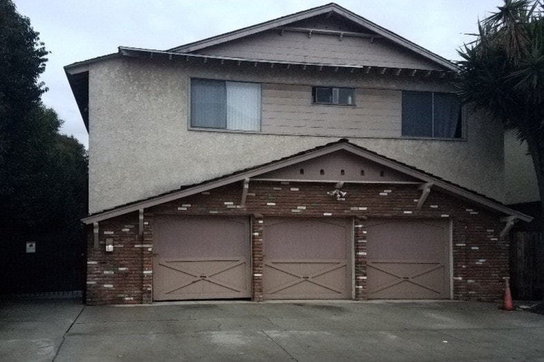 Front of building. 2 tandem parking spots. - 3112 S Durango Ave