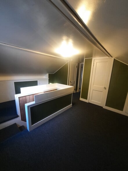 Upstairs - 608 W Church St