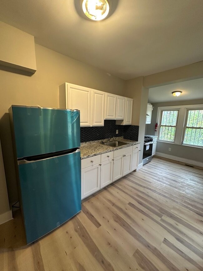 Building Photo - Beautifully Renovated 3-Bedroom Twin Home with Spacious Layout & Fenced Yard