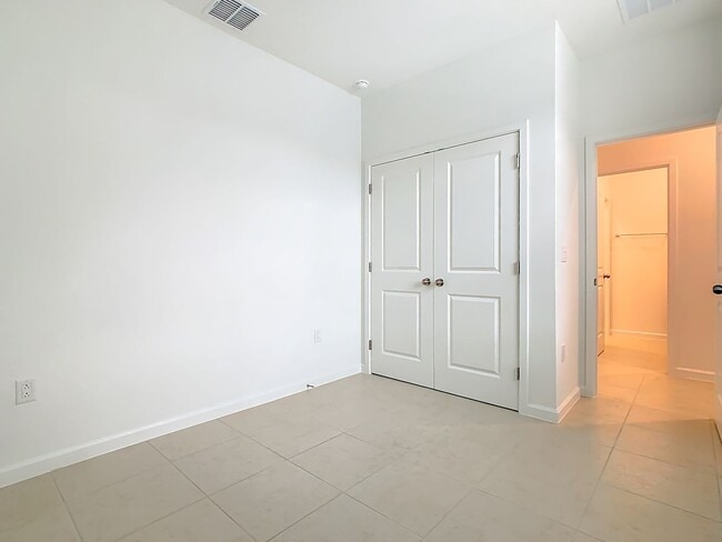 Building Photo - New Luxury Townhome in Celebration, FL Corner unit.  All porcelain tiled floors.  Aleutian model ...