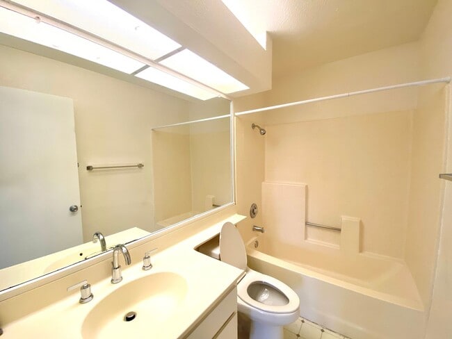 Building Photo - NEW PRICE! Spacious 3bdrm 2.5bath Condo w/2 car garage & private laundry hookups, community Pool ...