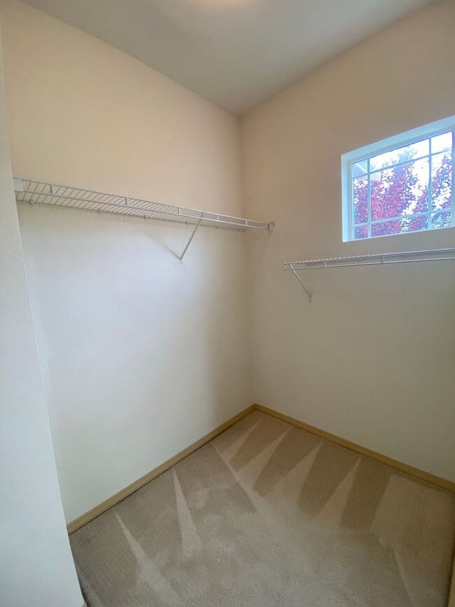 Building Photo - No Mower Needed! Great Townhome In A Beautifully HOA Maintained Community