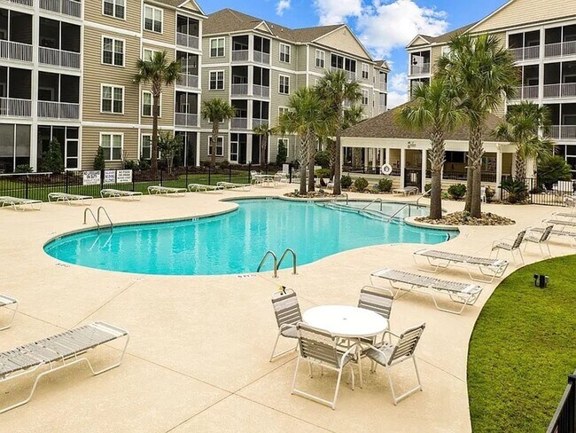 Building Photo - Dive Into Your New Oasis!