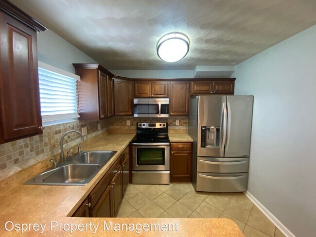 Building Photo - 4 br, 2 bath House - 6209 Ball Ave Procure