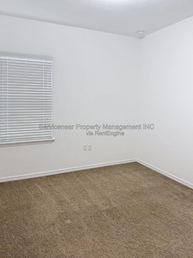 Building Photo - 9428 Woodcrane Dr