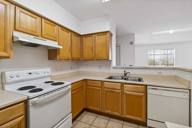 Building Photo - Spacious 1-Bedroom Condo for Annual Rent available now in gated Villagio Community