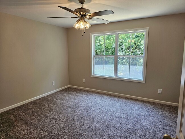 Building Photo - Built in 2024! Close to downtown 2 Bed/2.5 Bath. Nice private backyard with trees